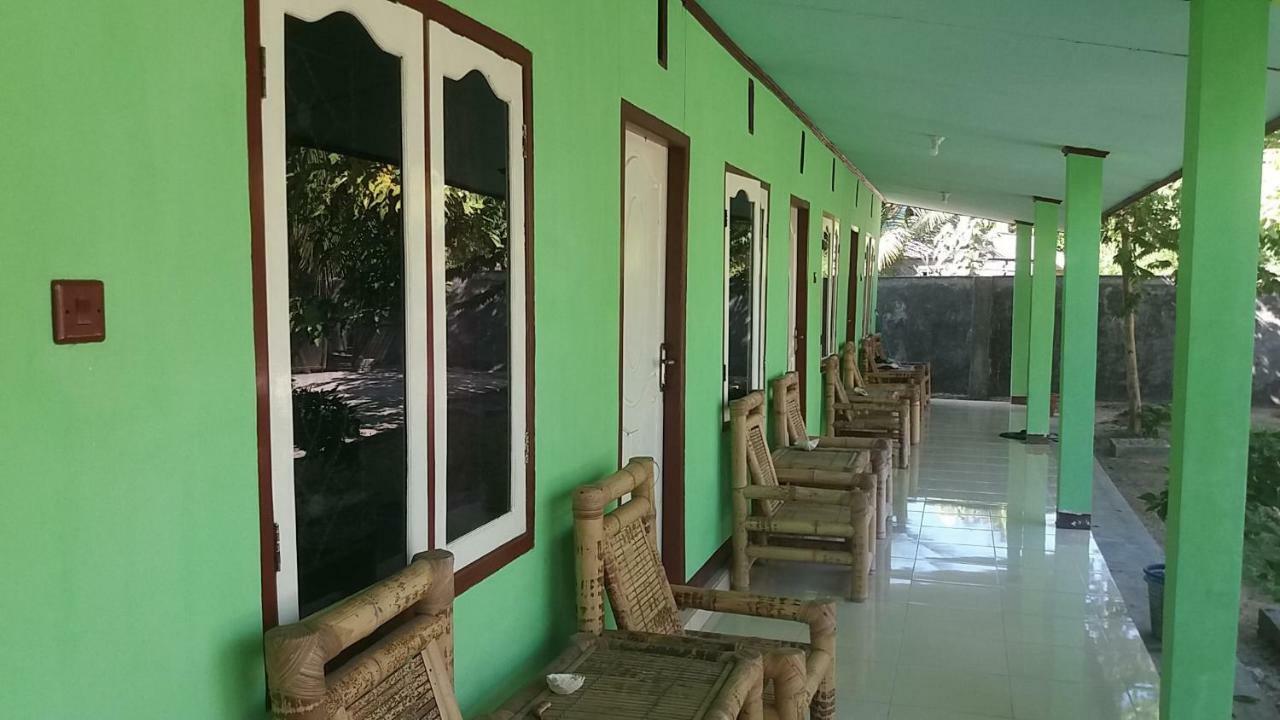 Ekas Beach Guesthouse Mitra Reddoorz Exterior foto